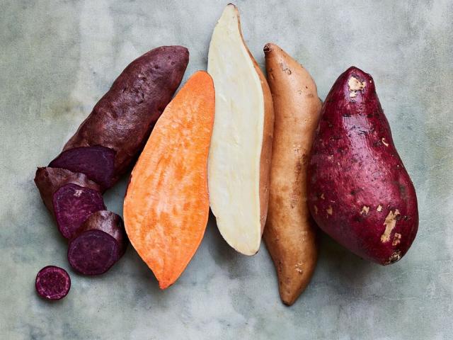 series of 5 sweet potatoes, colored orange, white, and purple