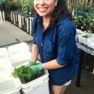 Karla Huerta with grape plant